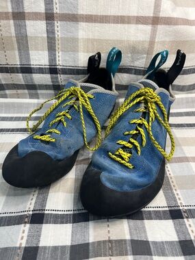 Scarpa blue suede climbing shoes with yellow accents